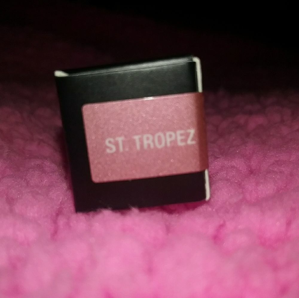 Lip gloss. Pink and gold sparkly color!